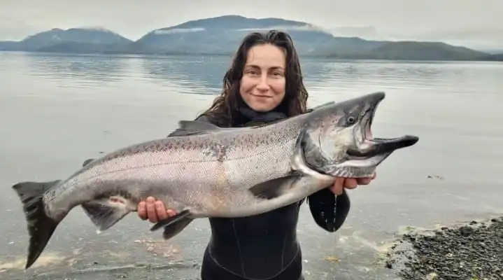 She Caught the World's Largest Silver Salmon Fish: A Remarkable Feat!